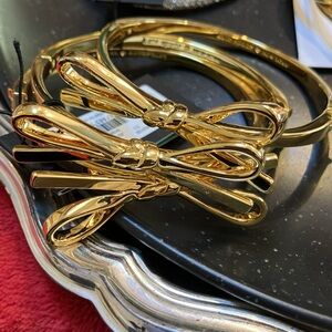 kate spade-$79 Skinny Mini Bow Bangle in Gold. NWT. Matching earrings & necklace